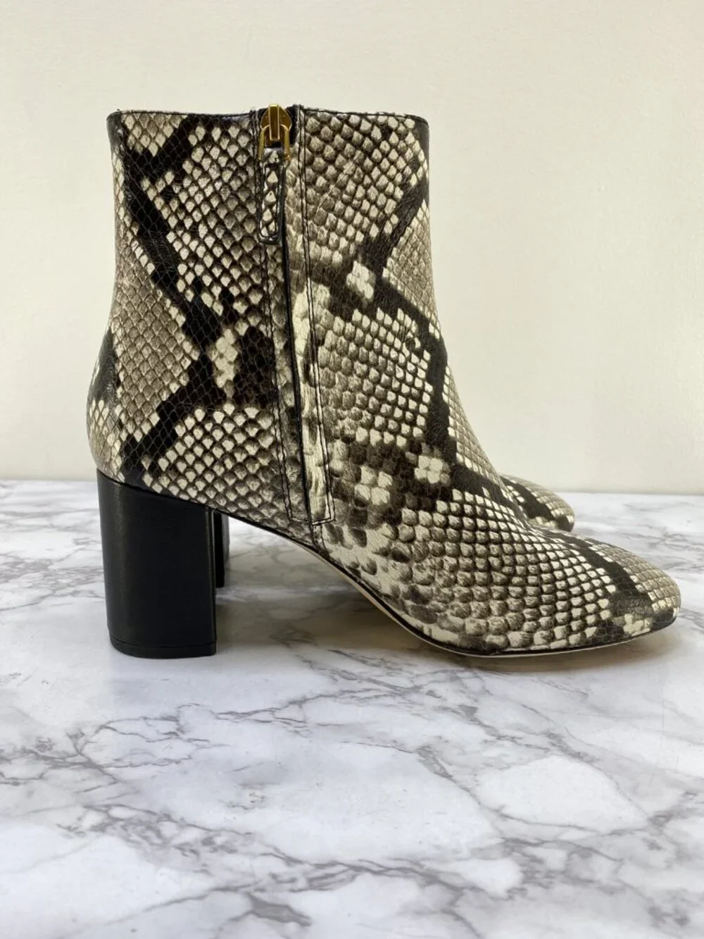 Tory Burch Women's Kira animal print black & White Boot Size 7 M